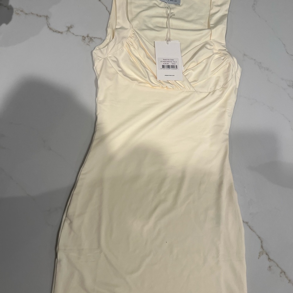 Elegant Cream Sleeveless Dress